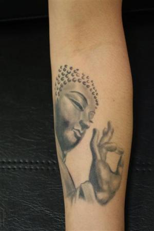 tattoo buddha onderarm
