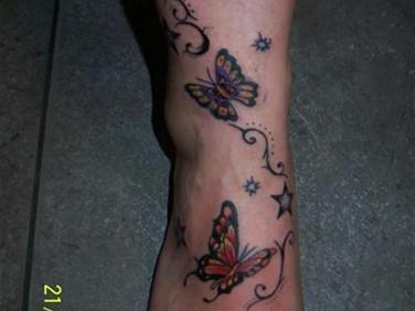 tattoo voet vlinder
